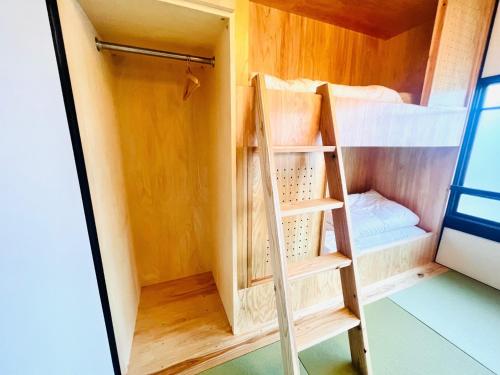 a bunk bed room with two bunk beds in it at CONNECT, - Vacation STAY 81699v in Arita
