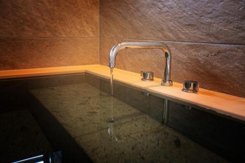 a sink in a bathroom with a water faucet at Nagi - Vacation STAY 55367v in Katori
