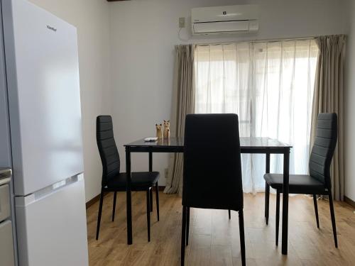 a dining room table and chairs in a room at weiwei - Vacation STAY 08698v in Wakayama