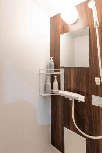 a bathroom with a shower and a mirror at HOTEL PG -2- - Vacation STAY 38330v in Onomichi