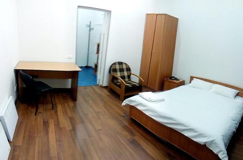 Säng eller sängar i ett rum på UKR Apartments on Independence Square