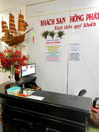 an office with a desk with a computer on it at Hồng Phát 68 Hotel in Ho Chi Minh City