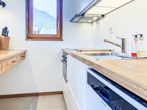 a kitchen with a sink and a counter top at Apartment Le Sporting 213 by Interhome in Champex