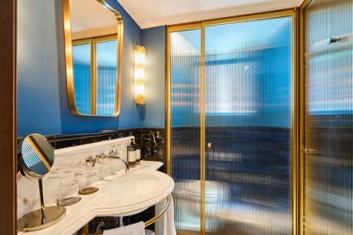 a bathroom with a sink and a shower at Hotel España Ocean Drive - Newly Renovated in Barcelona