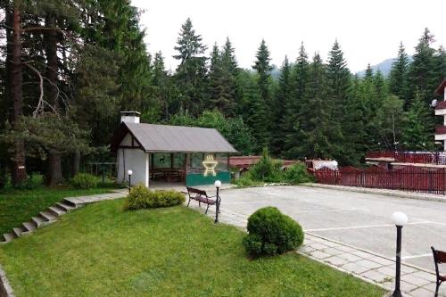 a parking lot with a basketball court in a yard at GO GO Holiday in Borovets