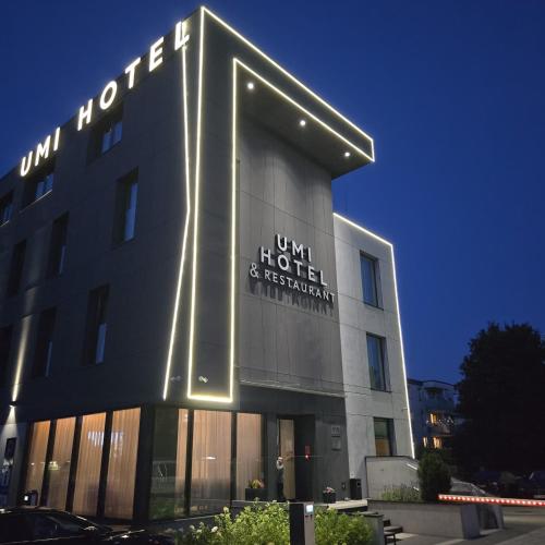 a building with a sign on the side of it at Great Polonia Umi Hotel Sopot in Sopot