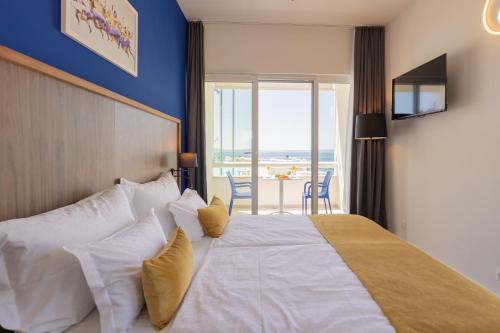 Lova arba lovos apgyvendinimo įstaigoje Hotel Sustipan