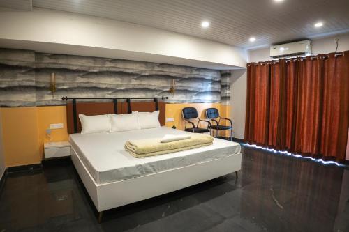 a bedroom with a large bed in a room at Divine View- Boutique Stay in Guwahati