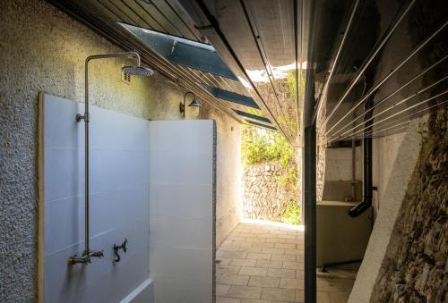 a bathroom with a shower and a walk in shower at Pentreath in Bude