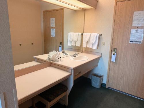 a bathroom with a sink and a mirror at Shilo Inn Mammoth Lakes in Mammoth Lakes