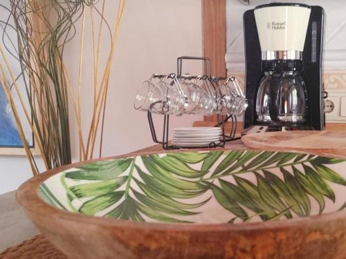 a bowl with wine glasses on top of it at Vivienda Vacacional La Cocada VV-144-AS in Arriondas