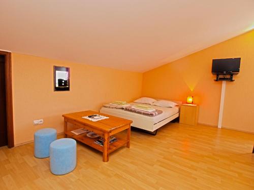 Postel nebo postele na pokoji v ubytování Apartments Denis 19