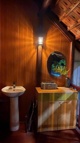 a small bathroom with a sink and a sink at Ako BM homestay in Buon Ma Thuot