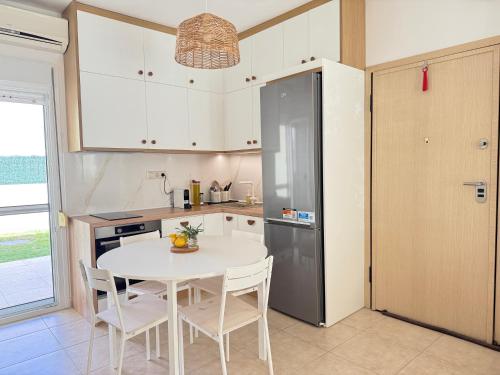New apartment with private yard 150m from beach