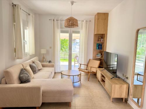 New apartment with private yard 150m from beach