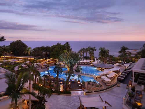 an aerial view of a resort with a swimming pool at Mediterranean Beach Hotel in Limassol