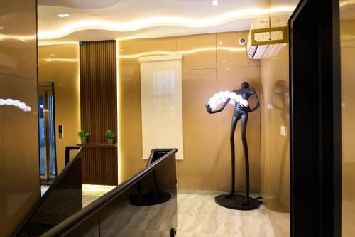 a mannequin in a display case in a building at Apartment60 in Lagos
