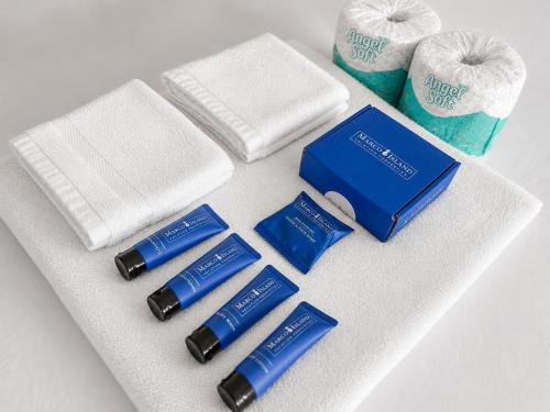 a group of products on a counter with towels at Beachfront condo with restaurant, pool, spa and gym in Marco Island