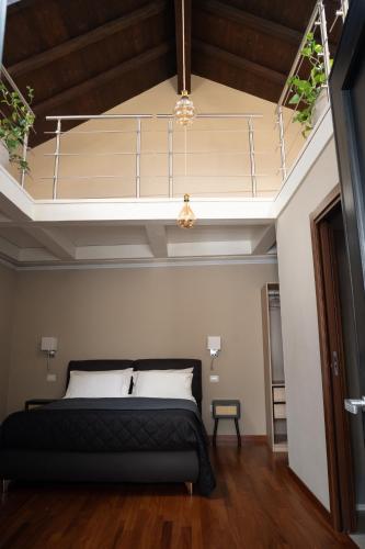 a bedroom with a bed in a room at B&B Sa Costera in Iglesias
