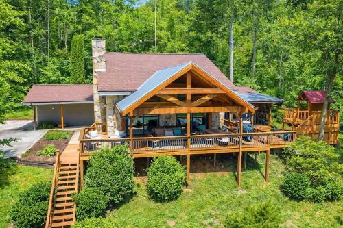 an overhead view of a house with a large deck at Ultimate Lake Norris Getaway with Private Dock in New Tazewell