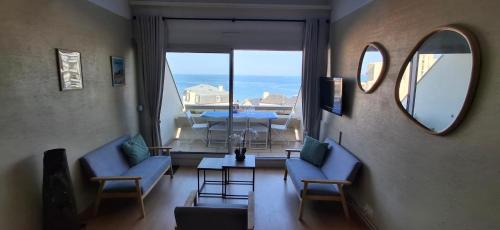 Duplex Saint Malo, front de mer, vue mer, plage, parking avec borne de recharge