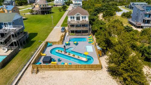 an aerial view of a swimming pool in a house at Rio Rodanthe Lazy River Kiddie Pool Oceanfront Elevator in Rodanthe
