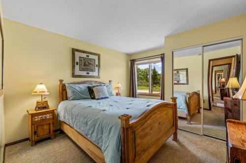 a bedroom with a bed and a large window at Indian in Clark