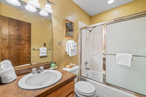 a bathroom with a sink and a shower at Indian in Clark