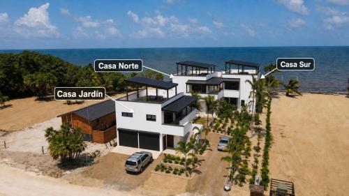 an aerial view of a house on the beach at Casa Sur – Oceanfront Villa in Placencia