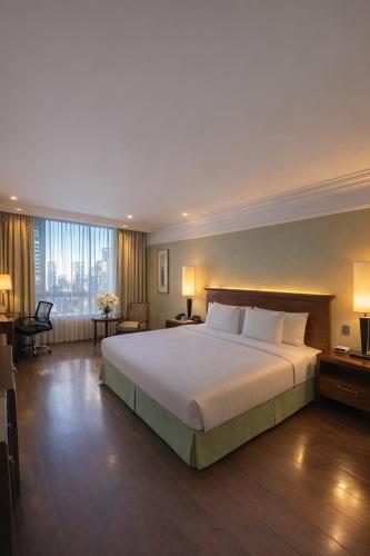 a bedroom with a large bed and a large window at Regal Pacific Puerto Madero in Buenos Aires