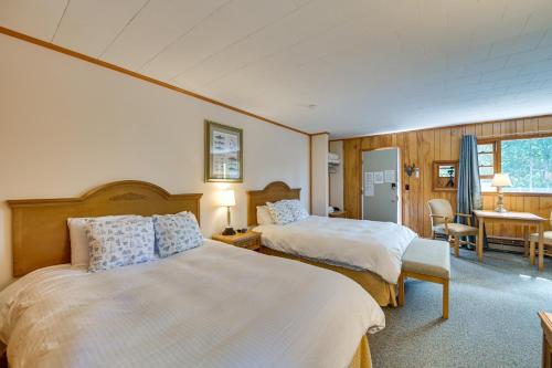 a hotel room with two beds and a desk at Lake Champlain Retreat w/ Dock, Games & More in Willsboro