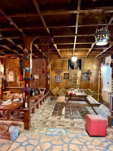 a living room with a couch and a table at Salah boutique camp in Nuweiba
