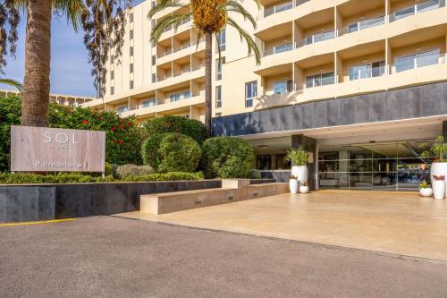 a building with a sign in front of it at SOL by Meliá Palmanova Mallorca in Palmanova