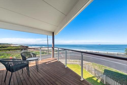 a balcony with a view of the ocean at Sea Sand and Serenity at Stockton - Stunning Sophistication in Stockton