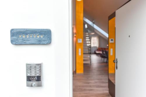 a sign on the door of a hospital hallway at Villa Salzburg by Welcome to Salzburg in Salzburg