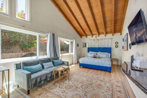 a living room with a couch and a bed at NEW Relax & Explore from MissionViejo | Pool | Spa in Mission Viejo