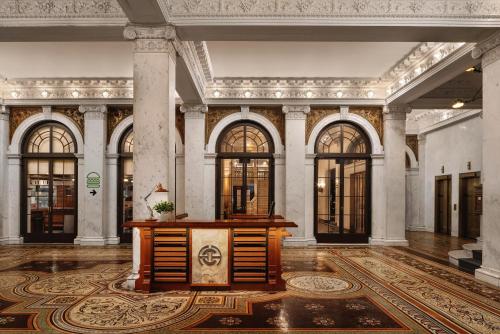 a large room with a podium in the middle of a building at Chicago Athletic Association, part of Hyatt in Chicago
