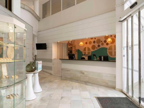 a store with a display case in a room at Ona Garden Lago in Port d'Alcudia