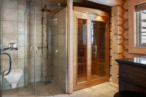 a bathroom with a shower and a toilet at Solskiva 23 in Trysil