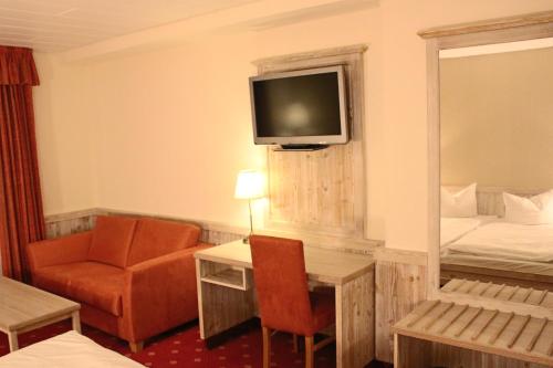 Ένα ή περισσότερα κρεβάτια σε δωμάτιο στο Central-Hotel
