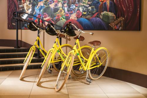 a row of bicycles on display in a room at Staypineapple, The Maxwell Hotel, Seattle Center Seattle in Seattle