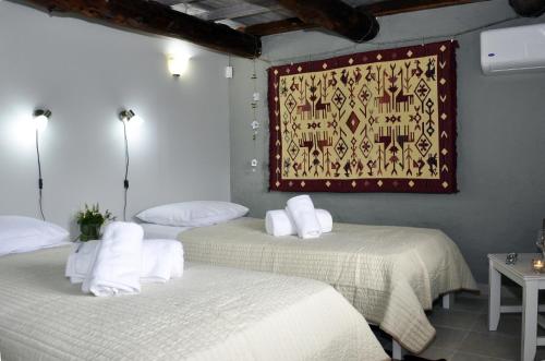 Postel nebo postele na pokoji v ubytování Villa Lakki Heated round pool Jacuzzi