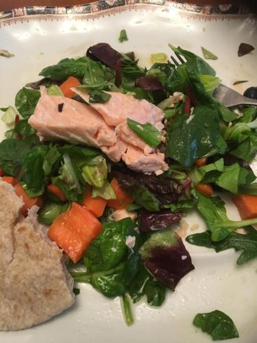 a white plate with a salad with meat and vegetables at Love & Peace in Orpington