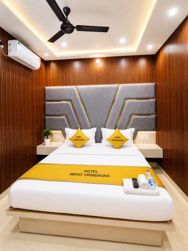 a bedroom with a large bed in a room at Hotel Mero Vrindavan in Chhatikara