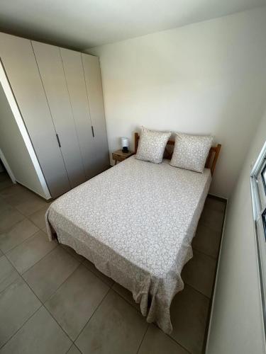 a bedroom with a bed in a room at La Kaz Saint-Annaise in Sainte-Anne