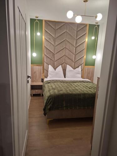 Llit o llits en una habitació de Łyso Chatka