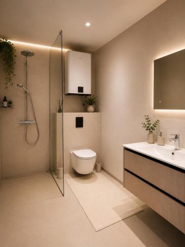 a bathroom with a toilet and a sink and a shower at Katariina allee korter in Võru