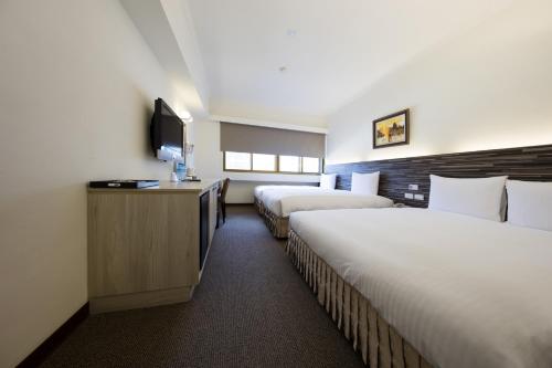 Katil atau katil-katil dalam bilik di Ful Won Hotel