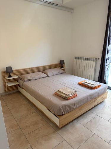a bedroom with a large bed in a room at Casina Toscana in Certaldo