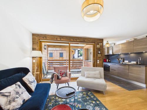 Appartement neuf, luxueux, au cœur des Gets avec terrasse, parking sécurisé, proche commerces et pistes.